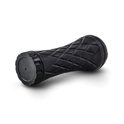 A black, cylindrical Blush M for Men The Torch Luscious Lips by Blush Novelties features a textured, diamond-patterned surface and ribbed pleasure design. It has flat, wider ends resembling a drum or spool. Made from life-like material, its set against a white background.