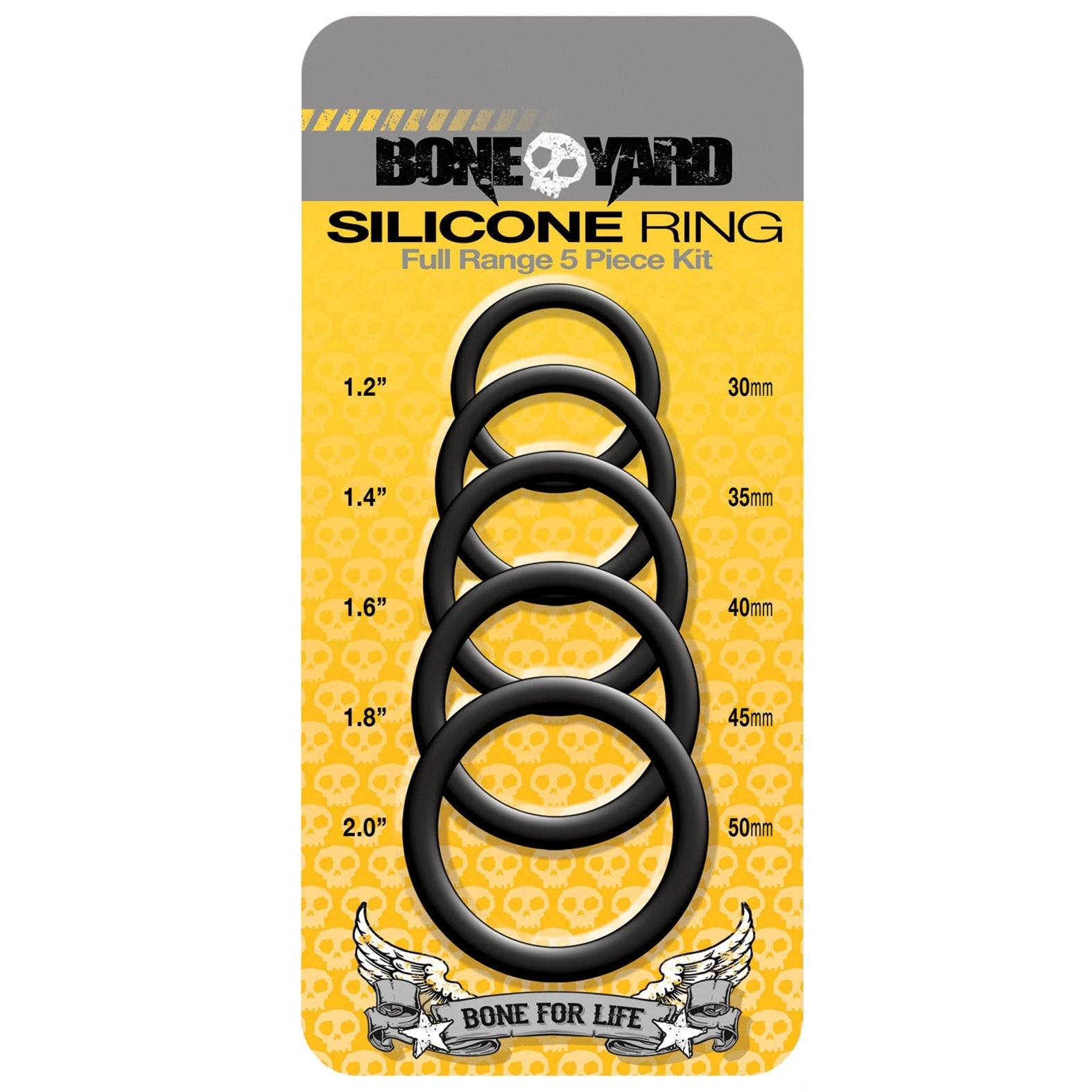 The Boneyard 5 pc Silicone Ring Kit by Boneyard features five pure silicone black cock rings (30mm, 35mm, 40mm, 45mm, and 50mm). The packaging has a vibrant yellow background with skull patterns for an edgy design.