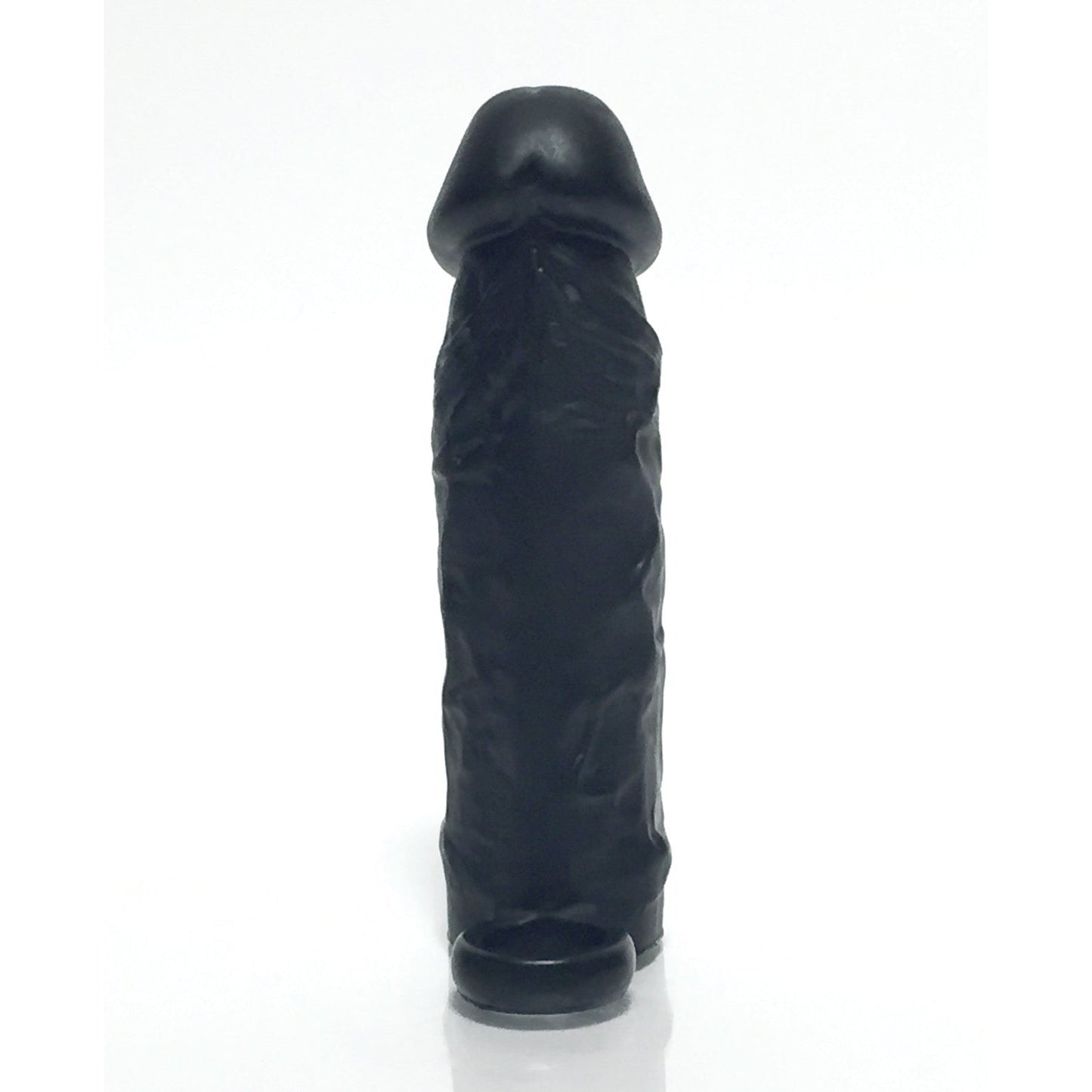 The Boneyard The Man Sizer 3X Stretch Silicone Extender, a black textured sleeve with a rounded top, stands upright against a plain white background.