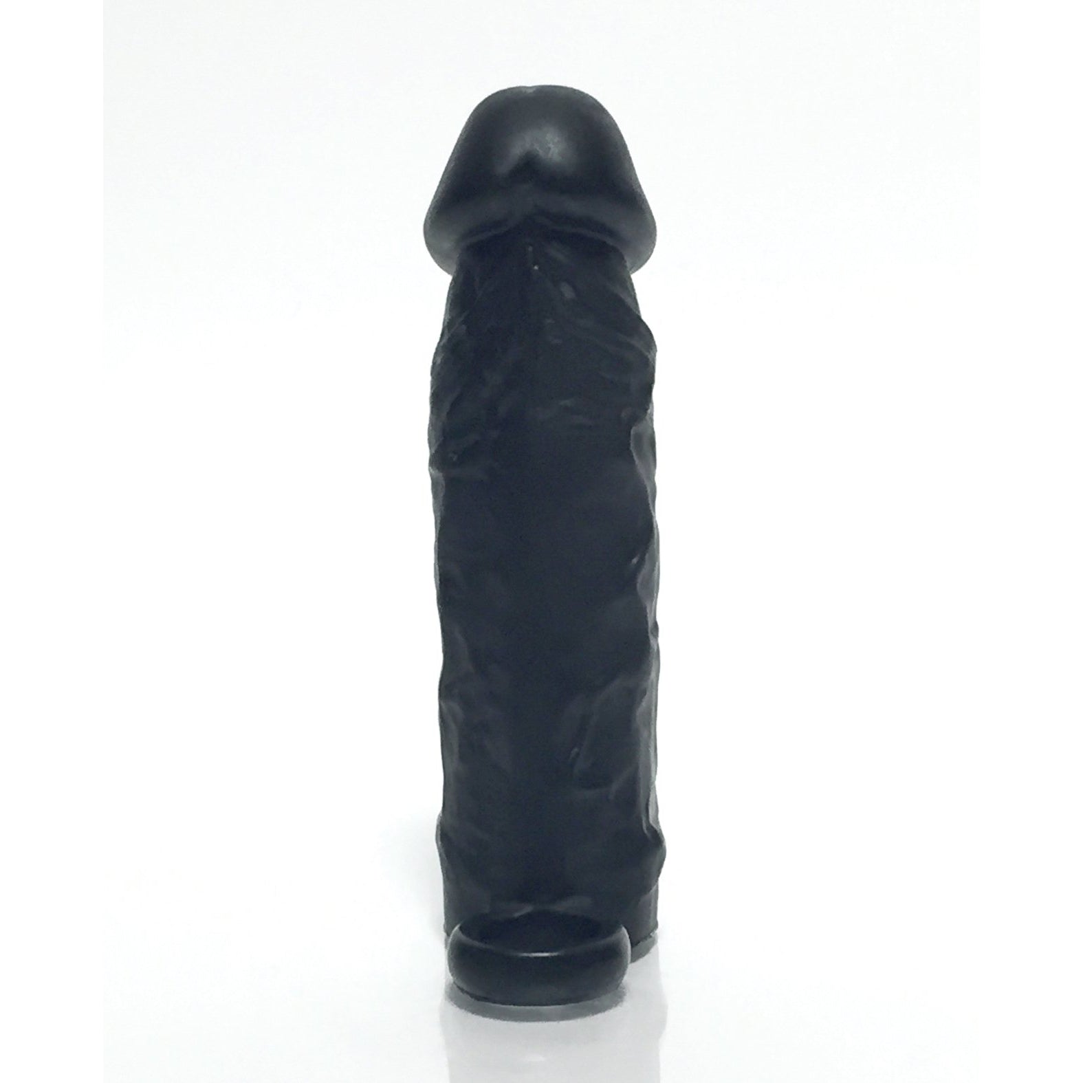 The Boneyard The Man Sizer 3X Stretch Silicone Extender, a black textured sleeve with a rounded top, stands upright against a plain white background.