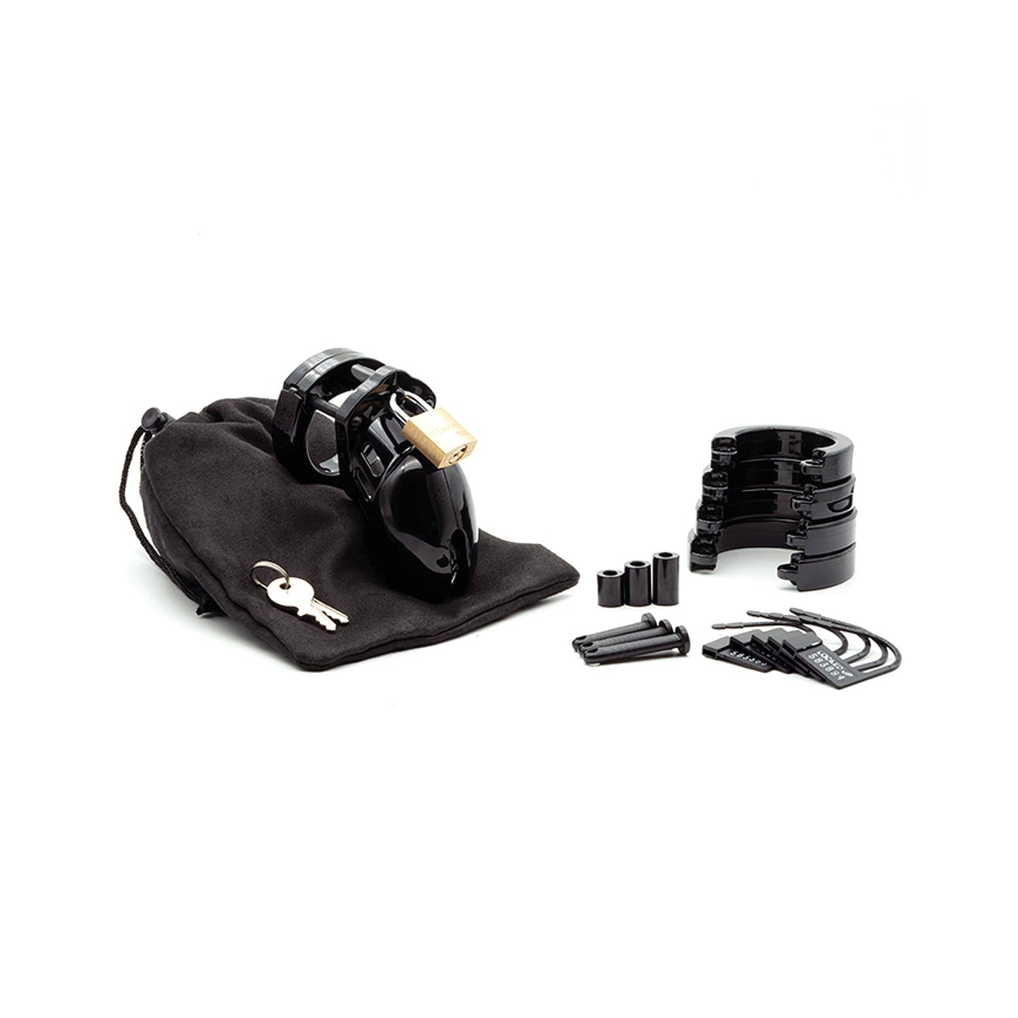 The black CB-6000S 2 1/2 Cock Cage & Lock Set, made from medical-grade polycarbonate, includes a gold lock, keys, adjustable rings, plastic spacers, and replacement pins, all neatly stored in a black drawstring pouch.