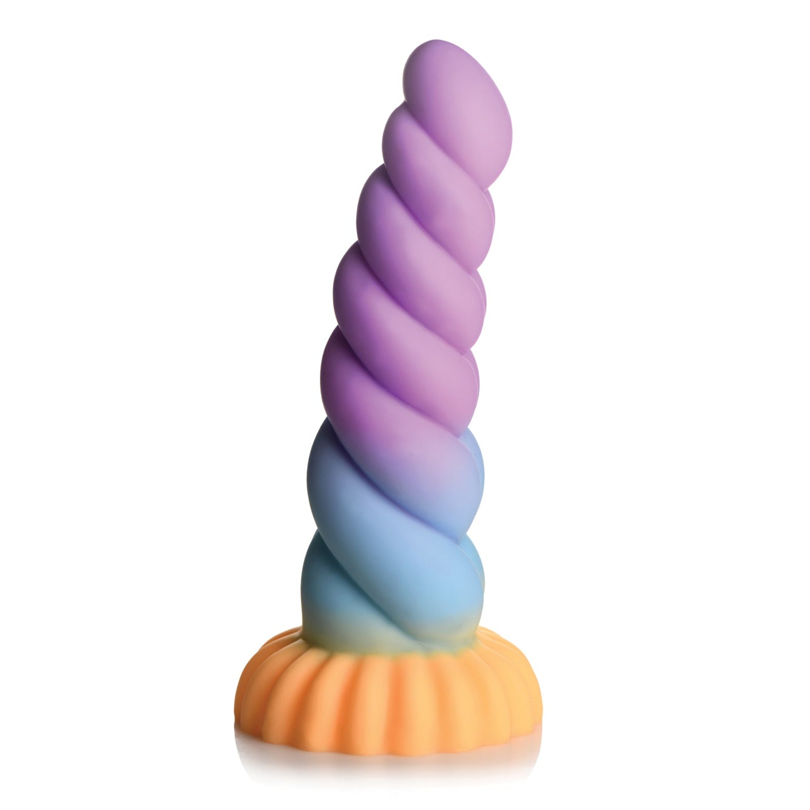 The Creature Cocks Unicorn Silicone Dildo by Creature Cocks is a vibrant, spiral horn-shaped toy with a rainbow gradient from purple at the tip to blue and orange at the base, standing upright.