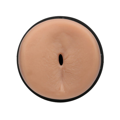 A detailed shot of the Man Squeeze ULTRASKYN Ass Stroker - Brysen by Doc Johnson shows its lifelike material with a unique internal texture and a narrow central opening. The darker outer rim forms a circular border, echoing Brysens design.