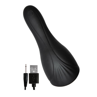 The Enhancer Ultimate Blow Job by Enhancer is a black, ergonomically designed electronic device featuring textured edges, sleek silicone construction, and comes with a USB charging cable equipped with a 3.5mm jack.
