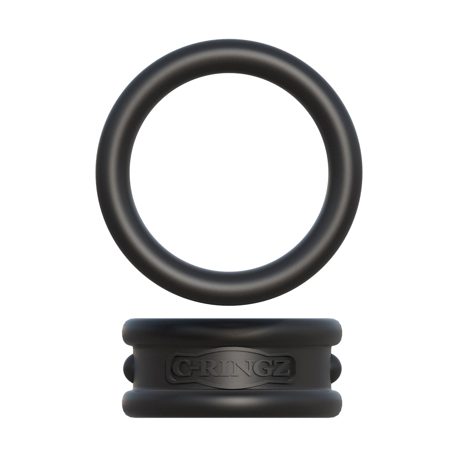 The Fantasy C-Ringz Max Width Silicone Cock Rings by Pipedream Products features a black silicone cock ring resting on a rectangular silicone block with embossed text, crafted from body-safe material. The ring and block are separate pieces, with grooves and raised lettering, isolated on a white background.