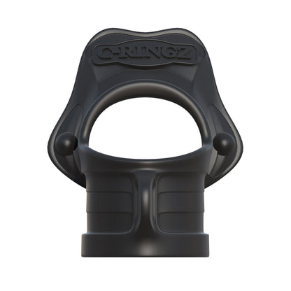The Fantasy C-Ringz Rock Hard Cock Ring & Ball Stretcher is a silicone black strap-on harness with a contoured design, featuring a built-in cock ring. The sleek, flexible material bears the Fantasy C-Ringz brand name embossed on the upper section.