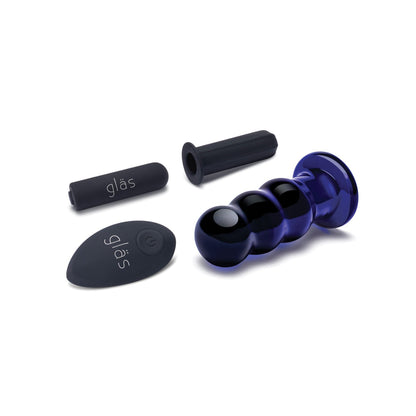A beaded anal plug with a textured surface, labeled Glas 3.5 Rechargeable Vibrating Beaded Butt Plug by Gläs, includes a black vibrating component and a black cap and disc, displayed on a white background.