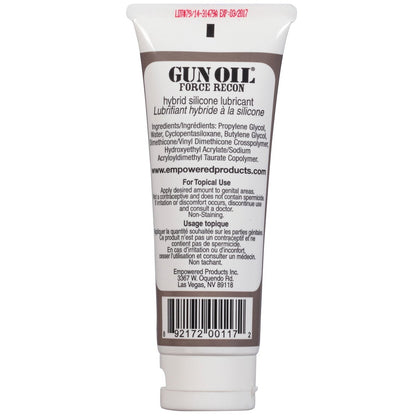 A tube of Gun Oil Force Recon Silicone & Water Based Hybrid Lube, featuring a non-staining formula. The label provides ingredients, usage instructions, and manufacturer info for safe topical use, enhancing your experience.