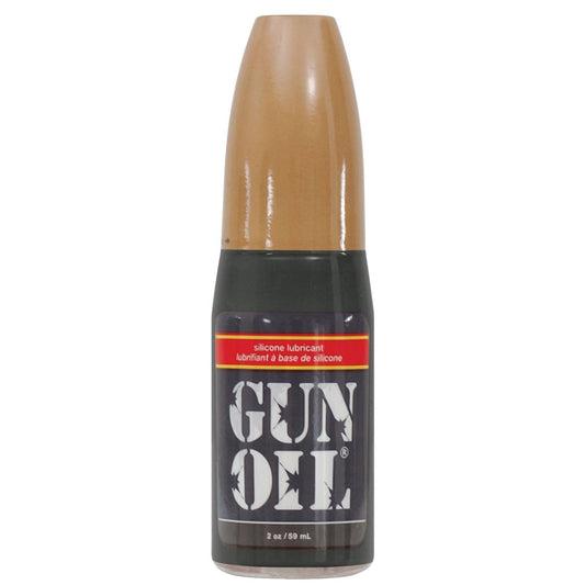 A 2 oz (59 mL) bottle of Gun Oil Silicone lubricant, enriched with Vitamin E. The packaging features a brown and black design with a bold red label, showcasing the Gun Oil product name in clear white uppercase letters.