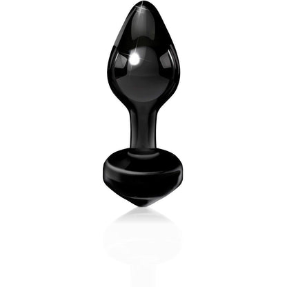 The Icicles No. 44 Hand Blown Glass Butt Plug, by Icicles, is a black teardrop-shaped object with a glossy, reflective surface. It stands upright on a smooth base against a white background, inviting curiosity and offering an intriguing visual appeal reminiscent of exquisite glass art.