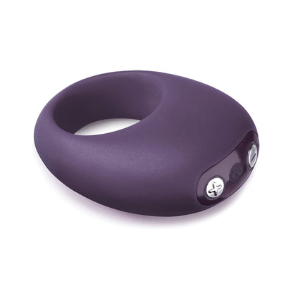 A sleek, dark purple Je Joue Mio Cock Ring with two small buttons offers a smooth, modern design for wearable use. Its vibrating functions indicate it is more than just an accessory from Je Joue.