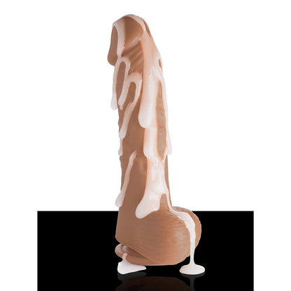 The Loadz 8.5 Squirting Dildo by Loadz features an anatomically detailed design, draped in melting white wax, set against a minimalist backdrop.