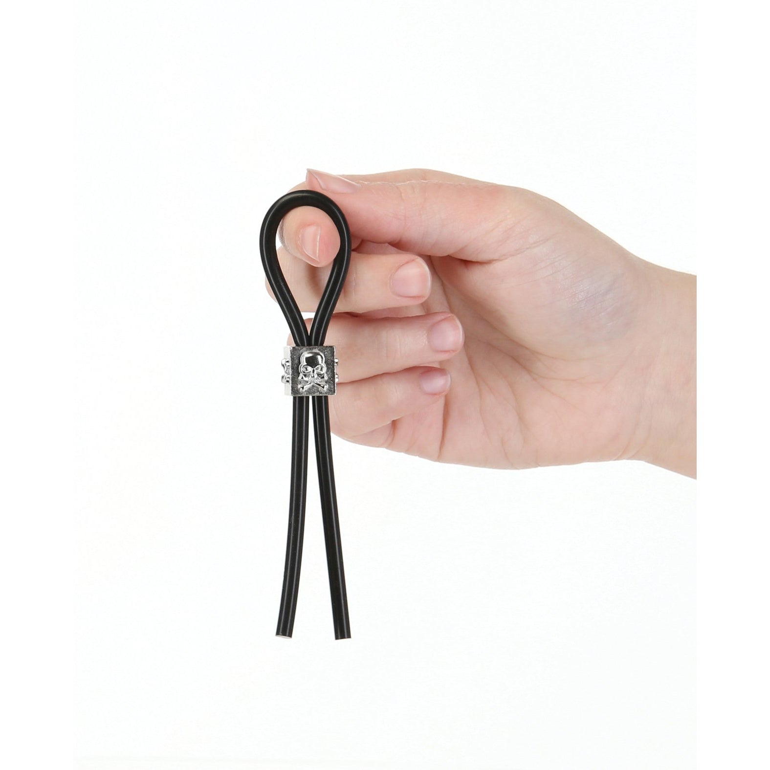 A hand holds the Lux Active Tether Adjustable Cock Tie by Adams Toy Box, a black cable looped and secured with a silver clip, made from body-safe silicone for comfort and durability, set against a plain white background.