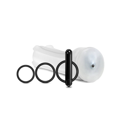 The MSTR B8 Vibrating Stroker Pack Hand Cuff - Kit of 5 features a white silicone attachment with a rounded tip, three customizable black rings in varying sizes, and a sleek black vibrating stroker, all elegantly arranged on a pristine white background to highlight their innovative design and superior materials.