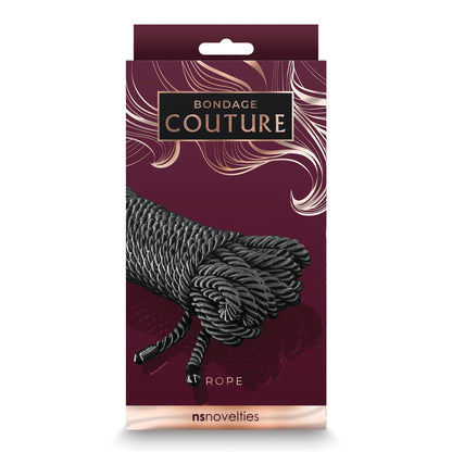 The Bondage Couture Rope package has a dark red design with swirls, showcasing tightly coiled black rope made from high-quality synthetic material. Bondage Couture is elegantly printed at the bottom, offering style and durability for your adventurous needs.