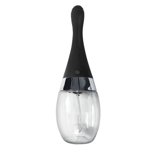The Electro Douche by Nasstoys is a transparent glass pepper grinder featuring a sleek black handle and a shiny silver band, offering rechargeable convenience and modern sophistication, prominently displayed from the front.