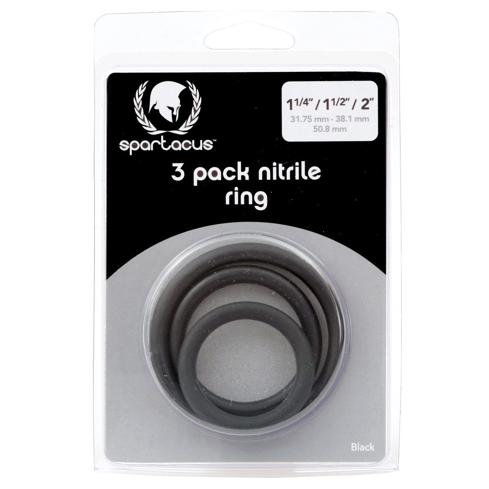 The Spartacus Cock Ring Set Pack of 3 packaging displays three skin-safe black rings in sizes 1-1/4, 1-1/2, and 2 with measurements in inches and millimeters, along with the prominent Spartacus logo.