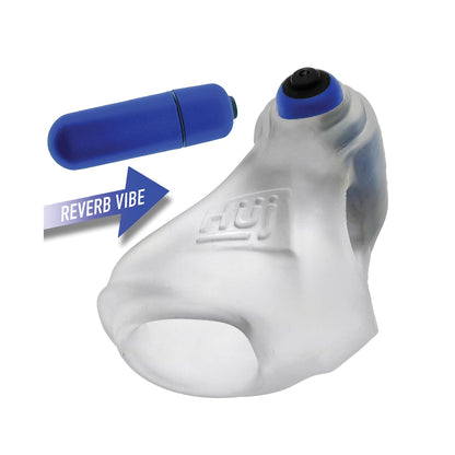 The Hunky Junk Revsling Sling With Vibe, a translucent silicone accessory with a black button, includes the blue Reverb Vibe cylinder from the REVERB vibe unit collection. It features an arrow indicating its Plus+SILICONE mix for added comfort and flexibility.