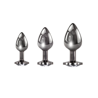 The Playboy 3 Ways Butt Plugs set includes three metal, teardrop-shaped tools with smooth, reflective surfaces and wide bases, arranged from small to large for the perfect booty game upgrade against a plain white backdrop.