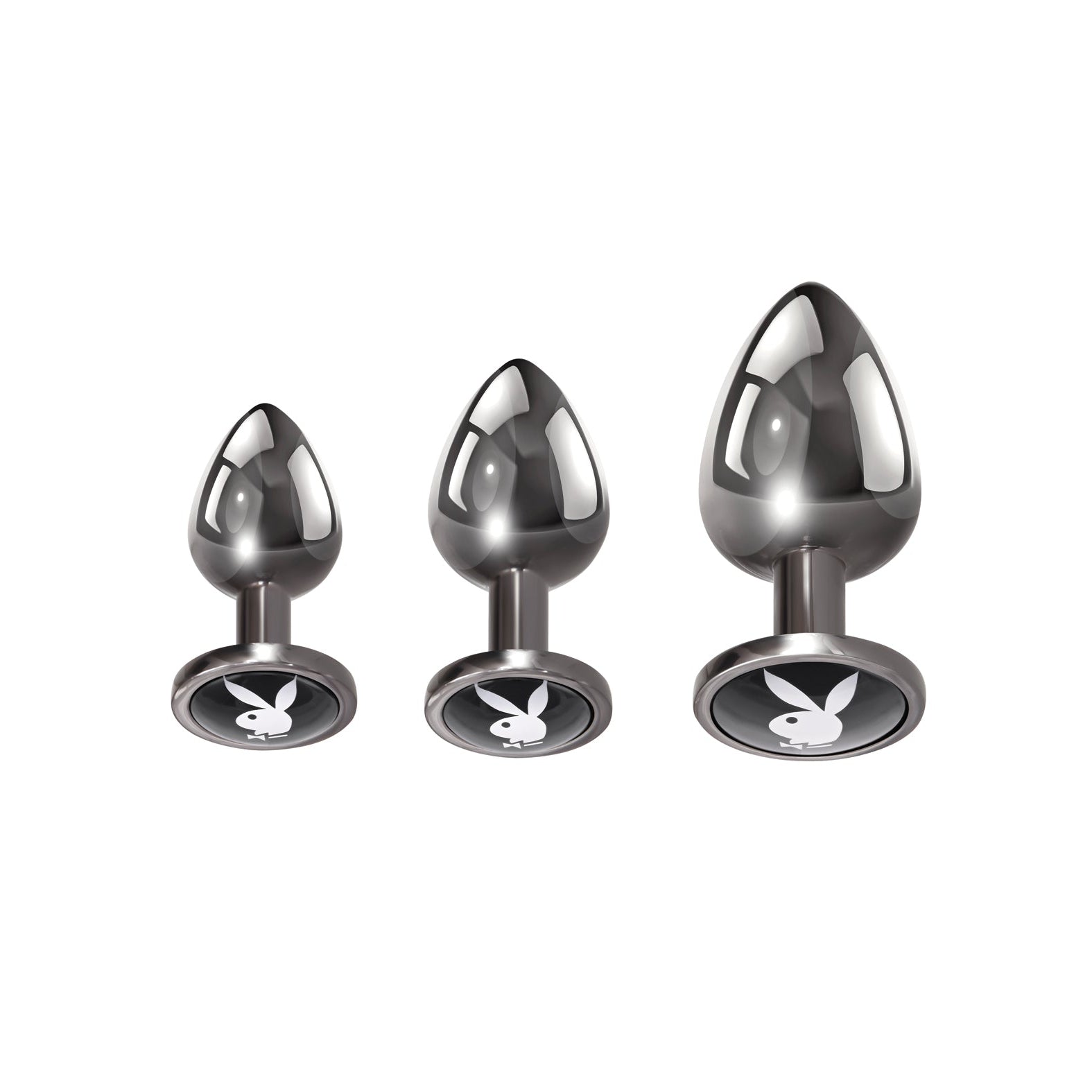 The Playboy 3 Ways Butt Plugs set from Playboy includes three metallic, teardrop-shaped plugs of varying sizes, each with a base featuring a white bunny logo on a black circular background. This sophisticated kit is perfect for an elegant anal training upgrade.