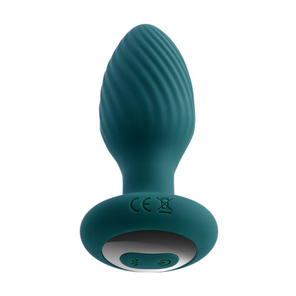 The Playboy Spinning Tail Teaser Butt Plug - Salute by Playboy is a teal ergonomic device with textured ridges and a rounded base with control buttons. It offers adjustable vibrating speeds for a comfortable, personalized experience and includes a remote control for ease of use.