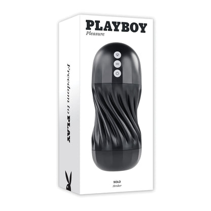 The Playboy Solo Stroker - 2 AM packaging features a sleek black design with wavy texture. The predominantly white box showcases product imagery and branding, including Freedom to Play along the side, emphasizing self-pleasure and its erotic potential.