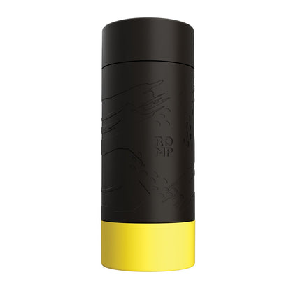 The ROMP Dash Stroker is a black, cylindrical silicone object with a yellow base and embossed textures. Featuring the text ROMP, its sleek design offers natural suction for an enhanced experience.