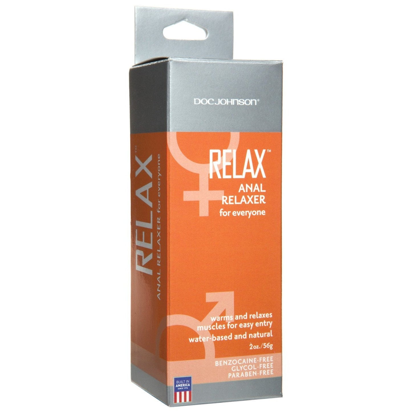 A rectangular box of Doc Johnsons Relax Anal Relaxer is displayed. The orange and gray packaging highlights its natural, water-based formula, free of benzocaine, glycol, and parabens. This 2 oz (56g) product is designed for universal use.
