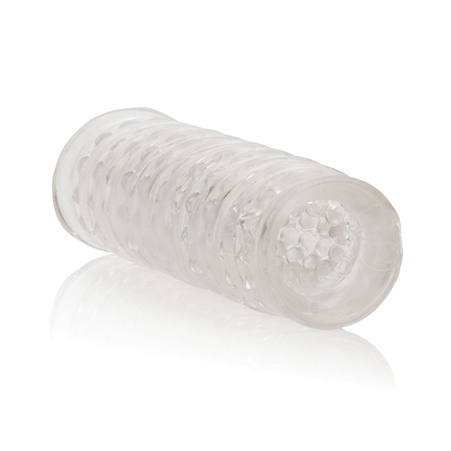 The Reversible Masturbator by Dr. Joel from California Exotic Novelties is a transparent cylinder with a textured surface and honeycomb-patterned ends, displayed horizontally on a clean white background.