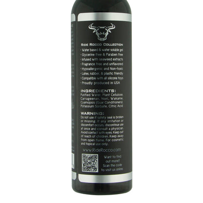 Close-up of the Ride Rocco Water Based Lube label from the Ride Rocco Collection highlights features like paraben-free and seaweed extract for longevity. Includes a QR code, website URL, ingredients list, and warning.