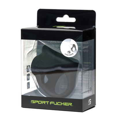 The Sport Fucker Cock Chute is a sleek black silicone toy packaged in a transparent plastic box featuring the Sport Fucker brand name. This versatile accessory, with a convenient hanging tab, can be used as either a ball stretcher or cock ring.