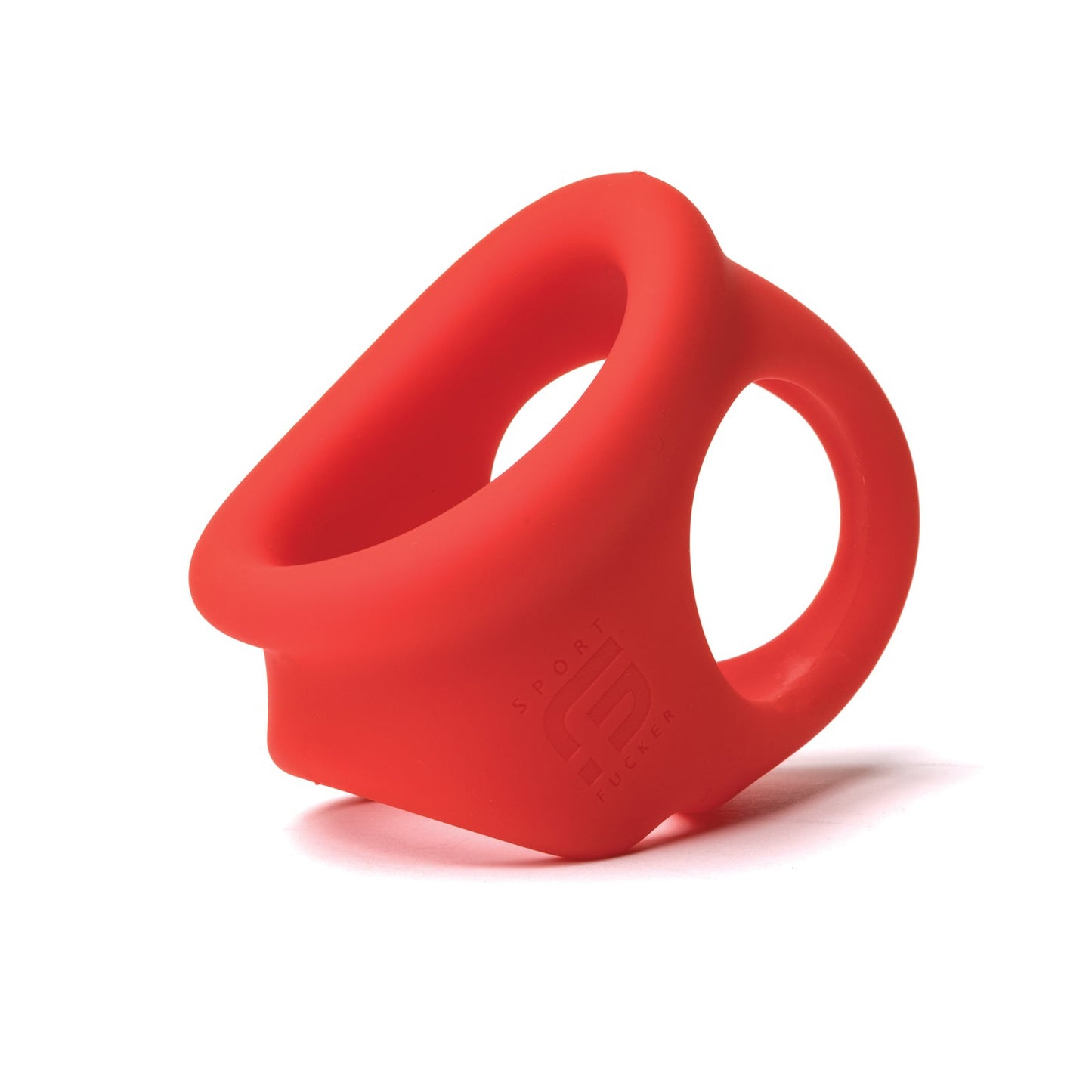 A red silicone Sport Fucker Cock Chute, featuring two linked loops and smooth edges, is displayed on a white background with the brand name Sport Fucker embossed on one side, offering a versatile cock ring solution.