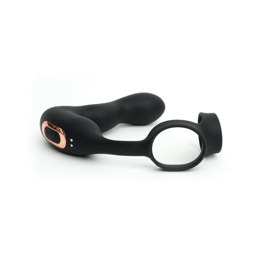 The Sport Fucker Motovibe Magnum Lock is a black and rose gold wearable toy from Sport Fucker, designed for intimate use. It features a curved shape, loop for easy handling, smooth matte finish, and remote control for customizable vibration modes.