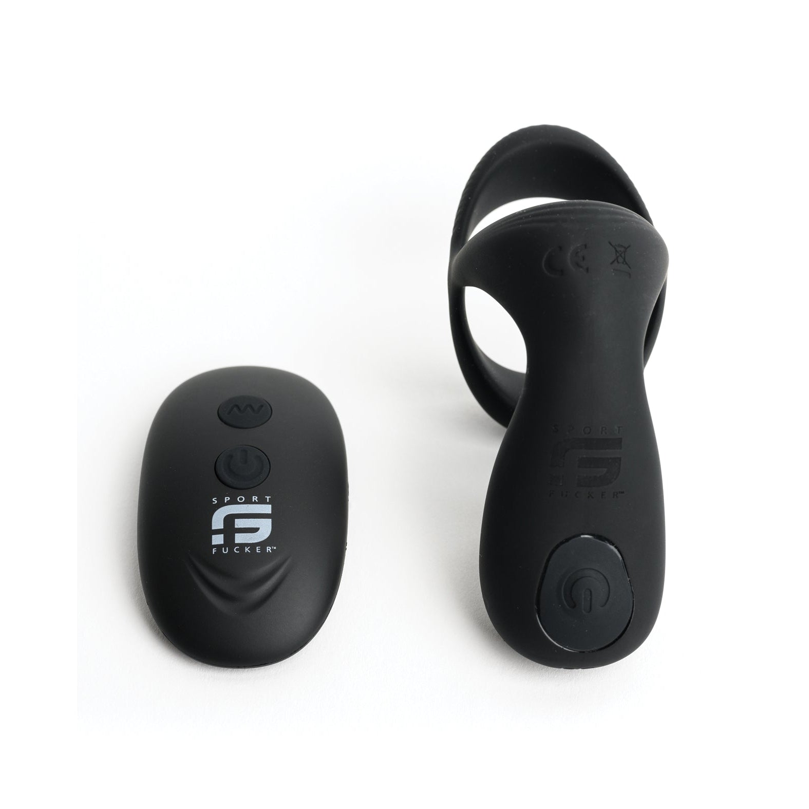 The Sport Fucker Motovibe Pulse Cockring, featuring a sleek black wireless remote with an on/off button and circular band, sits against a white background. Its water-resistant design makes it ideal for sports or fitness enthusiasts.
