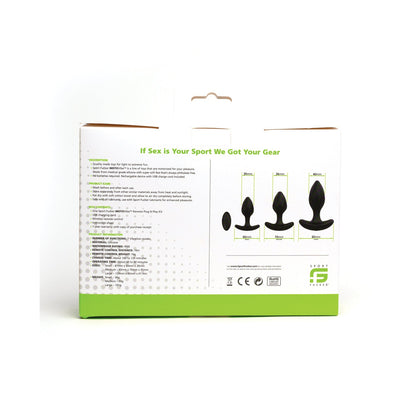 The Sport Fucker MotoVibe Plug N Play Kit features a box with three images of varying-sized black silicone anal plugs on the right, and product descriptions and benefits on the left. The white packaging with green accents ensures your booty workout is both stylish and effective.