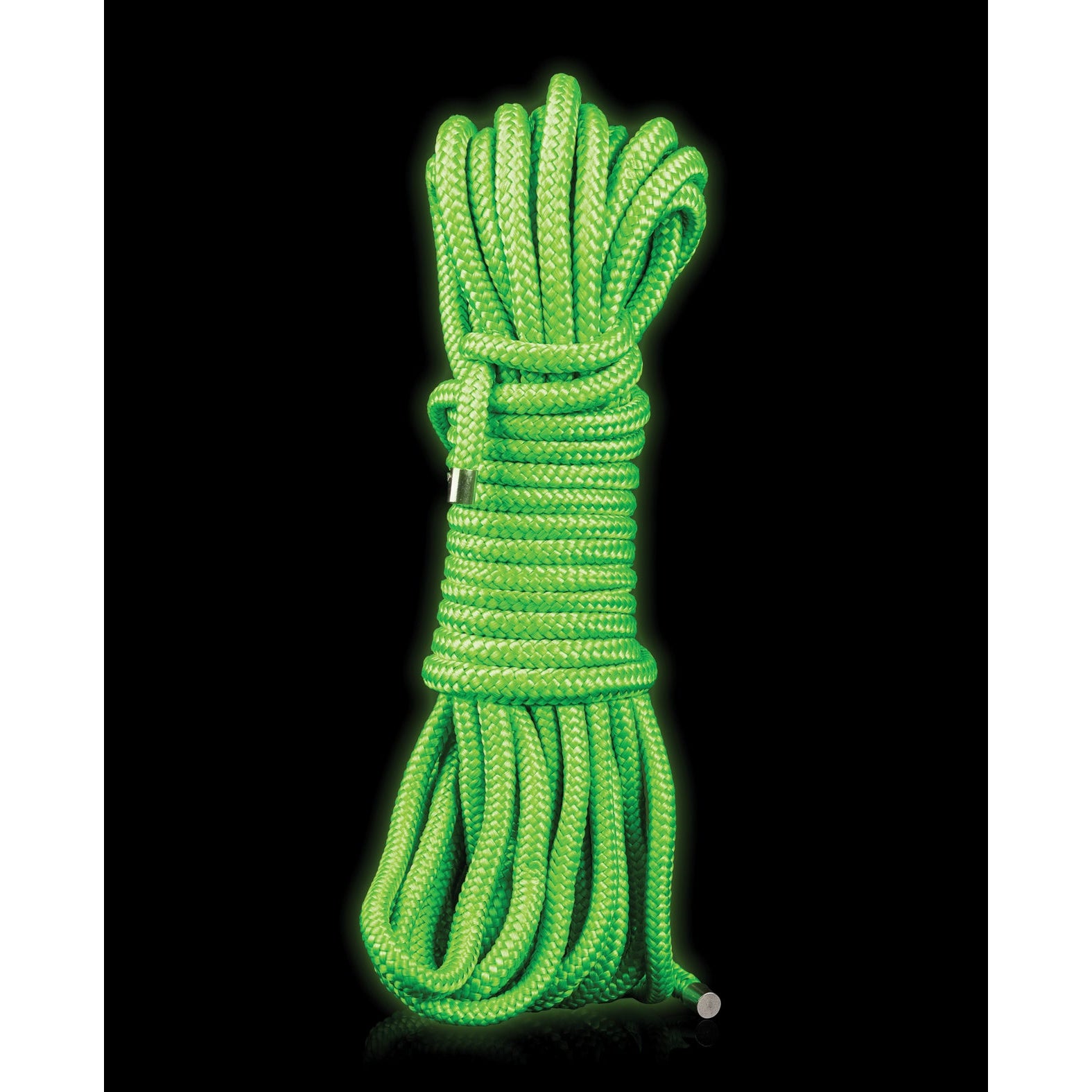 The Shots Ouch 10m Glow in the Dark rope coils neatly against a black backdrop, exuding an intriguing allure with its fluorescent green hue reminiscent of glow-in-the-dark materials.