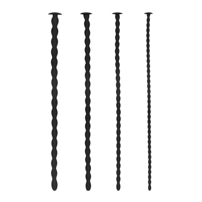 The white background showcases four black twisted spiral stakes of varying heights, resembling textured silicone spiral plugs. The product is the Shots Ouch Advanced Urethral Sounding Silicone Spiral Plug Set by Adams Toy Box.