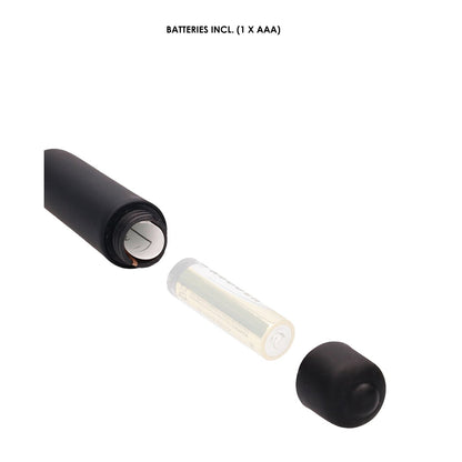 The Shots Ouch Extra Long Urethral Sounding Silicone Vibrating Bullet Plug, a black cylindrical device, is shown with its cap removed to reveal an empty battery compartment and an AAA battery separately labeled BATTERIES INCL. (1 X AAA).