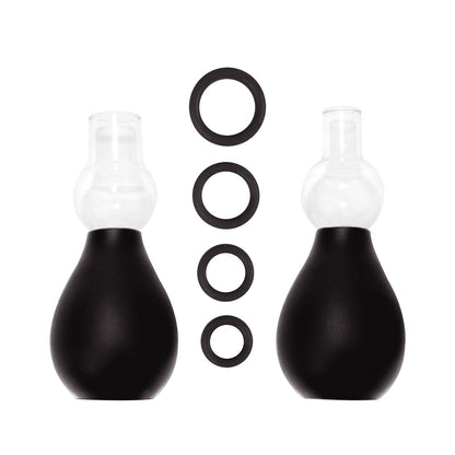 The Shots Ouch Nipple Erector Set – Black includes two black squeeze bulbs with transparent nozzle tops, and four vertically arranged black O-rings in varying sizes.