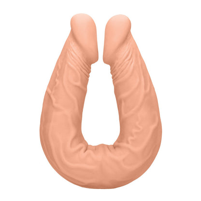 The Shots RealRock 14 Double Dong in Flesh is a U-shaped, flesh-toned sensory toy made from soft silicone, featuring a textured surface and two rounded ends for a dual experience.