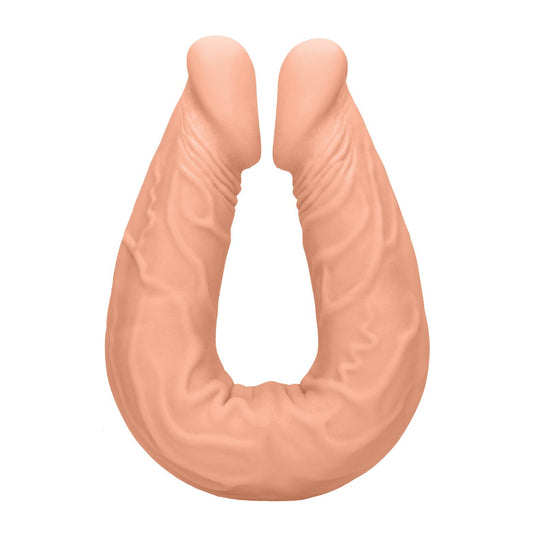The Shots RealRock 14 Double Dong in Flesh is a U-shaped, flesh-toned sensory toy made from soft silicone, featuring a textured surface and two rounded ends for a dual experience.