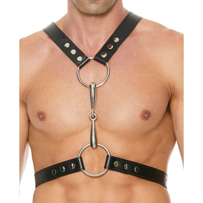 A person wearing the Shots Ouch Uomo Mens Harness with Metal Bit, a black leather BDSM accessory featuring metal rings and fasteners. This adjustable harness includes straps across the chest and shoulders, seamlessly blending style with function.
