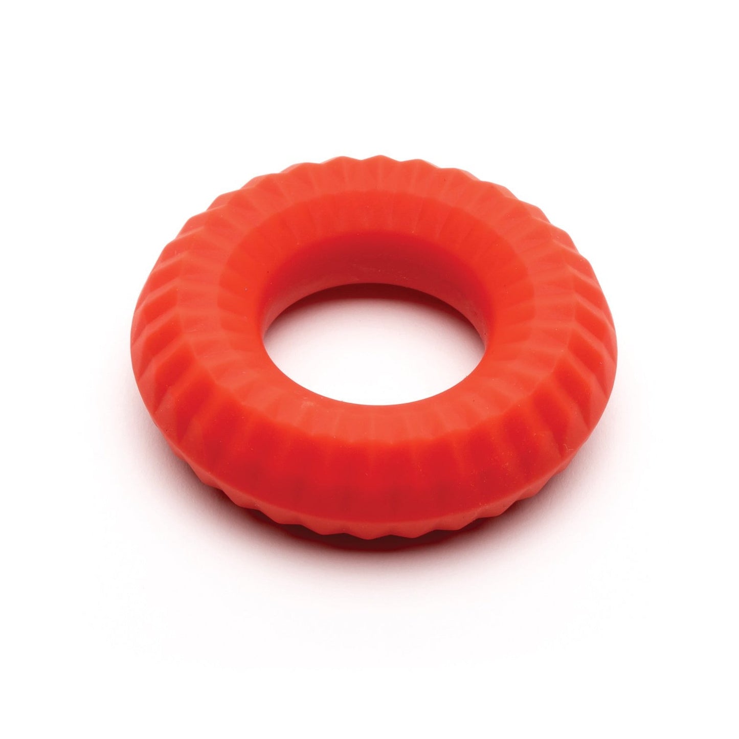 A vibrant red Sport Fucker Nitro Ring, a rubber dog chew toy shaped like a tire and featuring textured ridges, rests on a white background.