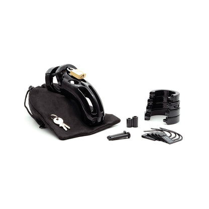 The CB-6000S Curve 3 3/4 Curved Cock Cage & Lock Set, made of medical-grade polycarbonate, in black is elegantly displayed on a white background with accessories such as keys, padlock, adjustable rings, spacers, and a fabric pouch.