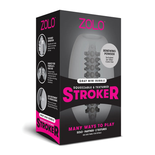 The image displays the Zolo Mini Bubble Stroker in a black and pink box, featuring a bubble-textured tunnel. The packaging highlights its skin-mimicking material and squeezable design, emphasizing versatility and ease of use.
