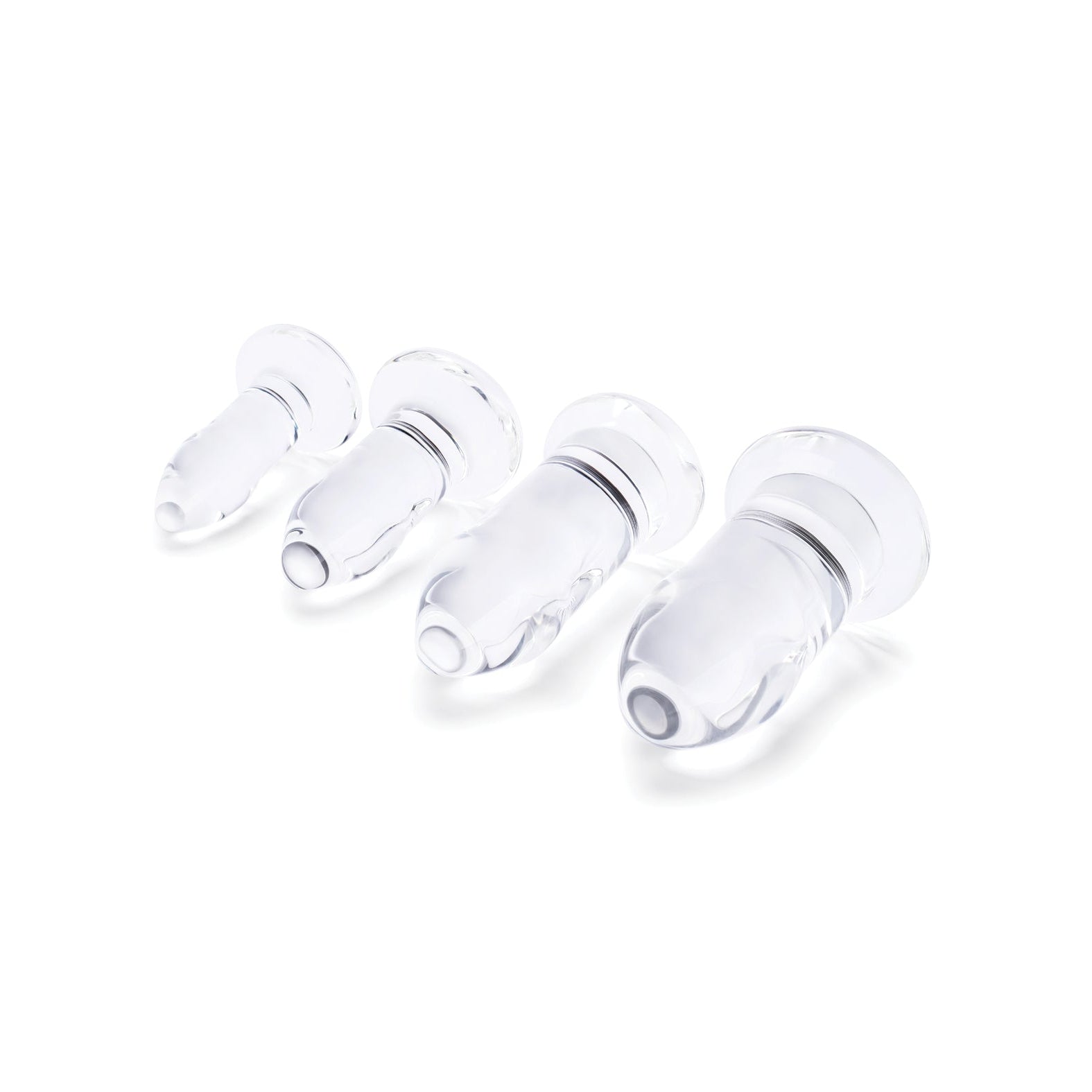 Four b-Vibe Glass Anal Dilators, crafted from body-safe materials and designed with flared edges for optimal comfort, are arranged in a row by size against a white background.