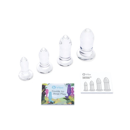 The b-Vibe Glass Anal Dilator 4 pc Set by b-vibe includes four clear, graduated glass dilators with a Guide to Anal Play booklet and a size card. Made from hypoallergenic, body-safe materials, theyre ideal for temperature play enthusiasts.