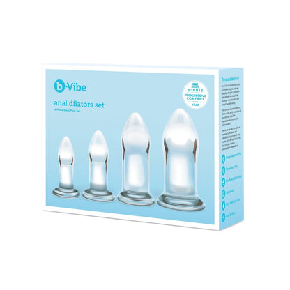 The b-Vibe Glass Anal Dilator 4 pc Set packaging features four transparent, hypoallergenic body-safe glass plugs in varying sizes, ideal for temperature play. It highlights the products accolades like Sex Innovation Product of the Year on the front.