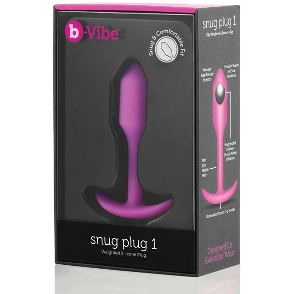 The box for the purple B-Vibe Snug Butt Plug 1 by b-vibe displays a weighted design crafted from body-safe, 100% silicone for comfort and prolonged use, featuring an image that highlights its snug fit and tapered tip.