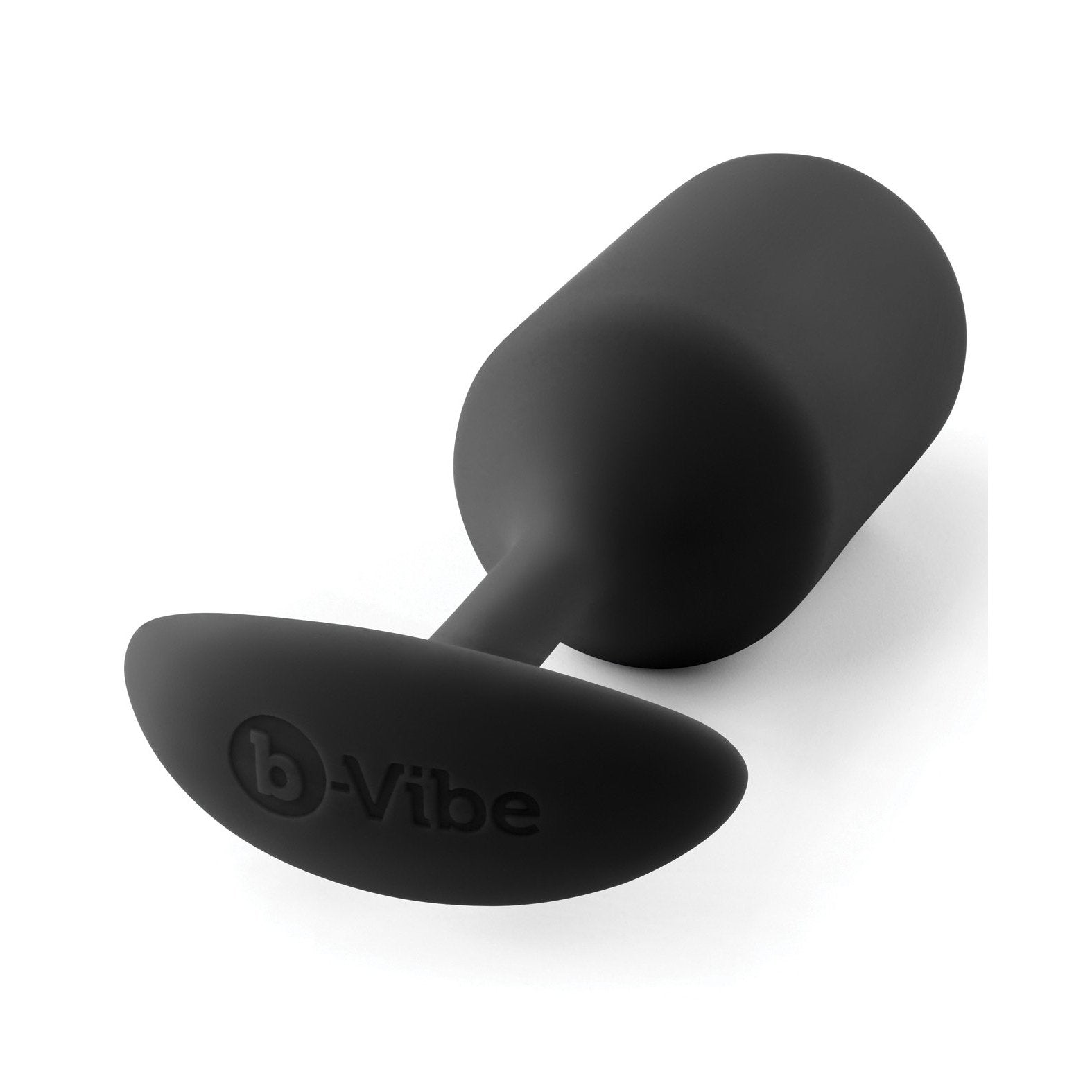 The b-Vibe Snug Plug 3 by b-vibe is a black, cylindrical silicone plug with a textured surface, flared base engraved with b-Vibe, and a body-safe, weighted design that ensures comfort and functionality with its smooth finish.